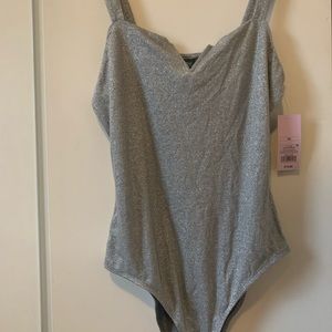 Never worn before bodysuit